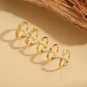 Set of five 14K gold plated adjustable rings with pink and purple zircon gemstones