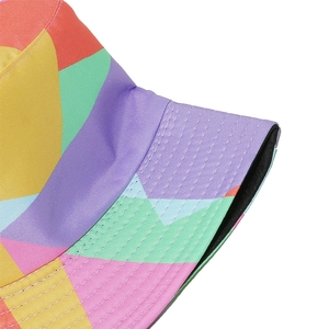 Close-up of rainbow geometric diamond pattern and fine twill stitching on bucket hat