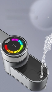 Detail view of the 120ml water tank filling process on a handheld garment steamer