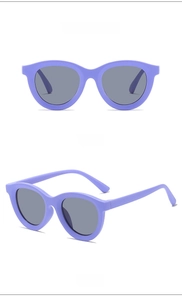 Detail view of purple round frame kids sunglasses with dark grey lenses in dual angles