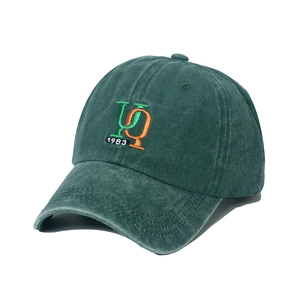 Vintage dark green washed canvas baseball cap with embroidered UQ 1983 lettering