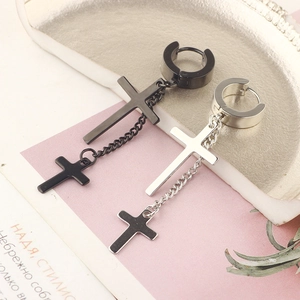 Detail of silver and black stainless steel cross earrings with chain link and hoop closure