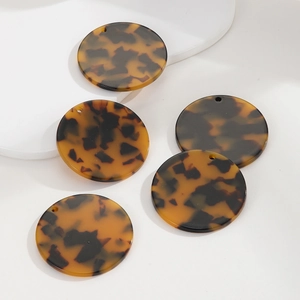 Set of five tortoiseshell acetate round charms for DIY jewelry making and design