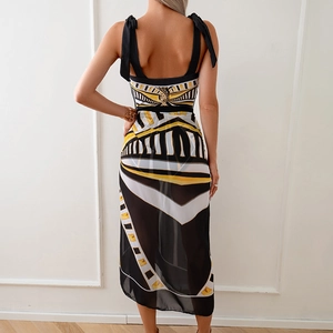 Back view detail of printed chiffon skirt and black tie-up top beach set for women
