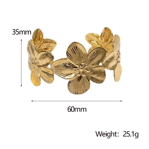 Detail view of gold flower bangle showing 35mm height and 60mm diameter specifications