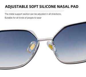 Close-up of adjustable soft silicone nose pads on square metal frame sunglasses