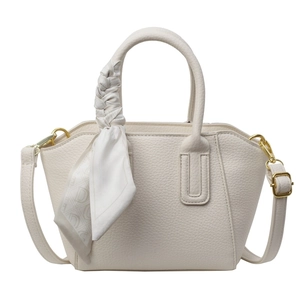 White lychee pattern bucket bag with silk scarf handle and gold hardware detail