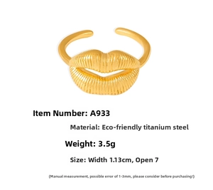 Detail of gold smiling lip ring in titanium steel with 1.13cm width and adjustable fit