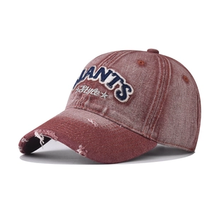 Vintage red washed cotton baseball cap with GIANTS Style embroidery and distressed brim