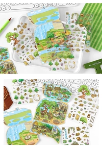 Macro view of fantasy landscape stickers with gold accents on desk with a keyboard