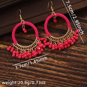 Detailed view of handmade rose red beaded hoop earrings with size measurements