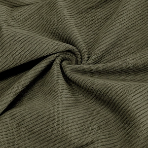 Macro shot of olive green corduroy fabric showing detailed striped texture and soft velvet feel
