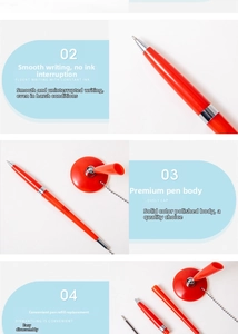Macro details of orange desk pen with secure chain and detachable core components
