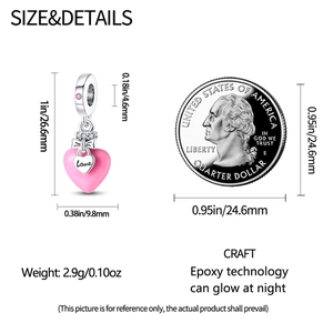 Detailed size map of pink heart charm showing dimensions and glow-in-the-dark feature
