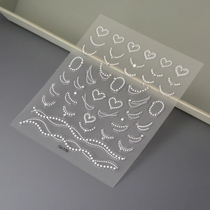 5D embossed nail art stickers with white pearls, crystals, and heart designs on Co-170