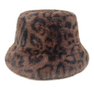Detail shot of the plush leopard print faux fur texture on a winter bucket hat