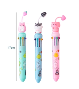 Close-up of 17cm 10-color ballpoint pens with cute hamster, husky, and pig 3D charms