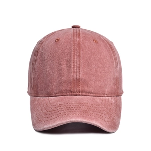 Close-up of vintage washed cotton baseball cap with reinforced stitching and eyelets