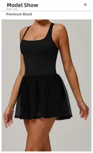 Detail of a black tennis dress with layered tulle skirt and high-elasticity fabric