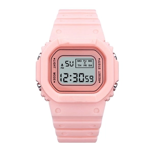 Macro detail of the pink digital sports watch with LED screen and four function buttons