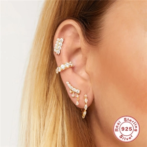 S925 sterling silver geometric stud earrings with pavé zircons worn on model ear