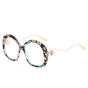Fashion round sunglasses with floral frames, golden wavy temples and pearl accents