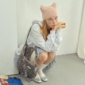 Pink knit cat ear beanie with ribbon bows and leopard print canvas tote bag