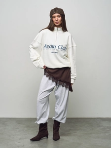 Oversize white half-zip sweatshirt with letter print and matching grey sweatpants