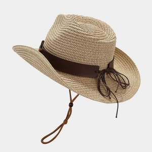 Western style straw cowboy hat with a brown decorative band and adjustable chin strap