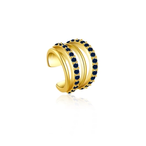 Detailed macro shot of four-layer gold ear cuff with sparkling blue zircon inlay stones