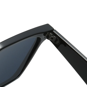 Modern black square sunglasses featuring a durable metal hinge and sleek polished frame