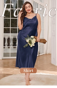 Detail of elegant navy blue satin slip maxi dress with premium silk-like texture and sheen