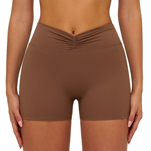 Brown high waisted yoga shorts with V-shaped ruched waist and peach lift design