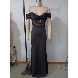 Detail view of black off-shoulder lace corset evening dress with boning structure