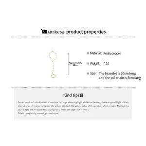 Detailed specs of resin and copper gold hand chain with 20cm plus 5cm extension