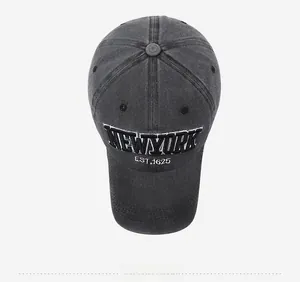 Top view of vintage dark grey washed denim baseball cap with New York 1625 embroidery