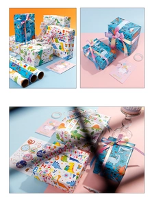 Detail of dinosaur wrapping paper set with ribbons, cards and stickers for birthday gifts