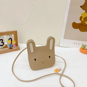 Detail of khaki rabbit toddler crossbody bag with cute 3D ears and stitched facial features