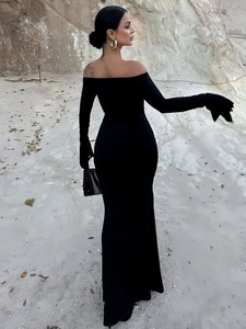 Elegant black off-shoulder long sleeve maxi dress with slim fit and flared cuffs