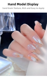 Detailed relief nail art showing 3D white roses and pearls on long coffin nails
