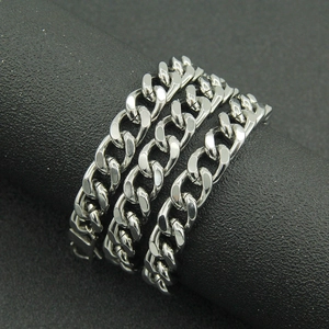 Classic 10mm stainless steel Cuban link necklace with polished silver finish on black stand
