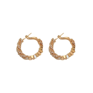 Golden geometric hoop earrings with sparkling zircon inlay and polished finish