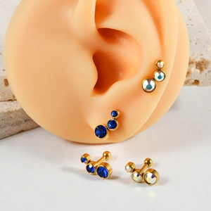 Clous d'oreilles 16G en acier doré avec cristaux tchèques bleus étincelants de luxe