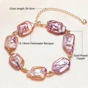 Baroque freshwater pearl bracelet with gold plated copper beads on pink satin background
