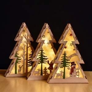 Detailed laser-cut wooden Christmas trees with reindeer and warm glowing LED lights