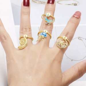 Marine series rings set with starfish and dolphin pendants in 18k gold plating
