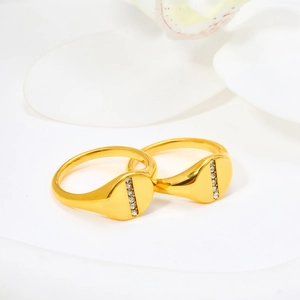 Elegant gold plated eternity ring with sparkling row of diamonds on white flower petals