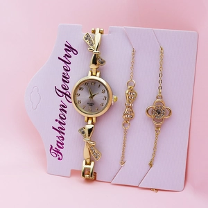 Elegant gold women's quartz watch and bracelet set with butterfly and clover charms