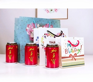 Three assorted sizes of floral gift bags with handles for birthday and holiday favors