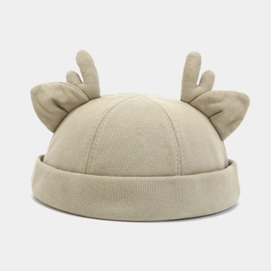 Beige knitted docker hat with cute 3D antlers and ears, stylish minimalist skull cap